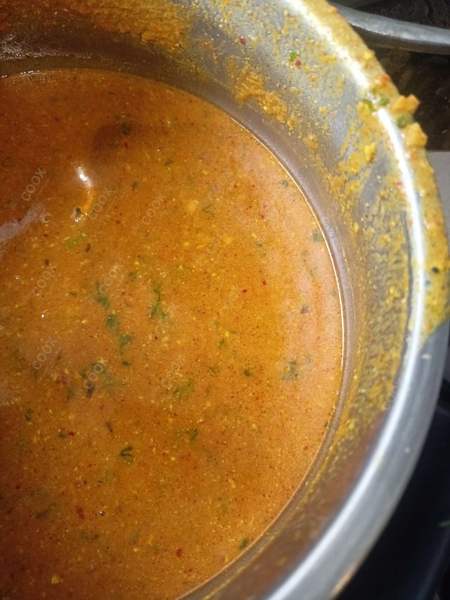 Delicious Stuffed Potatoes (Gravy) prepared by COOX