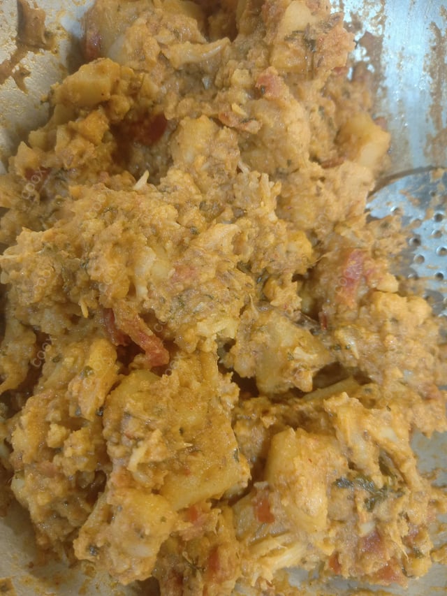 Delicious Dum Aloo prepared by COOX