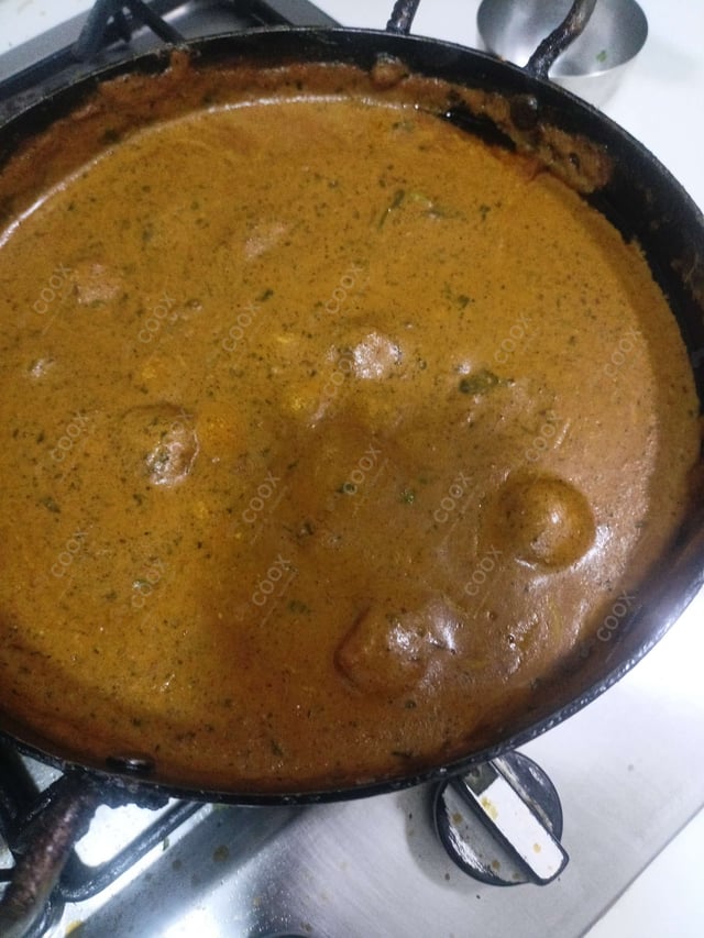Delicious Malai Kofta (Orange Gravy) prepared by COOX