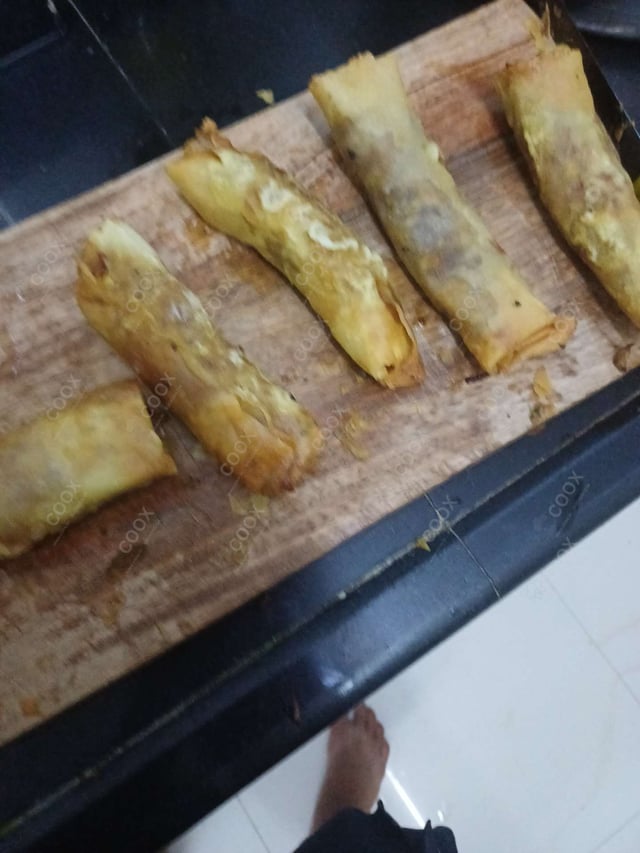 Delicious Veg Spring Rolls prepared by COOX