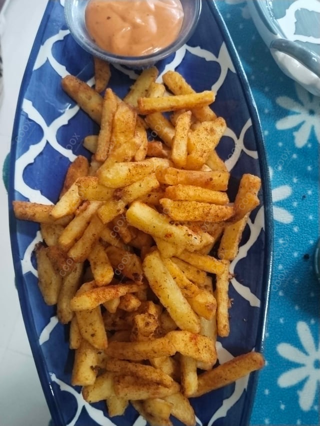 Delicious Peri Peri Fries prepared by COOX