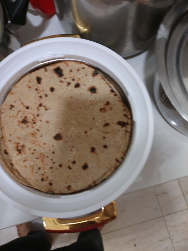 Delicious Tawa Rotis prepared by COOX