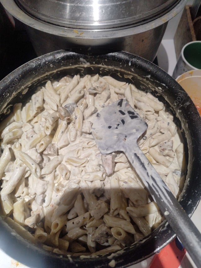 Tasty Chicken Pasta in White Sauce cooked by COOX chefs cooks during occasions parties events at home