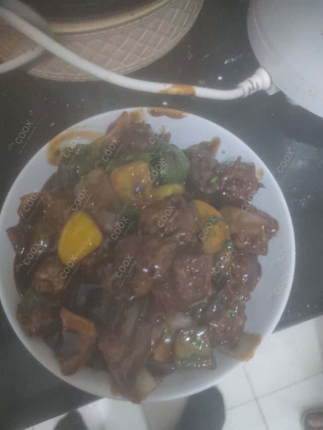 Delicious Veg Manchurian (Dry) prepared by COOX