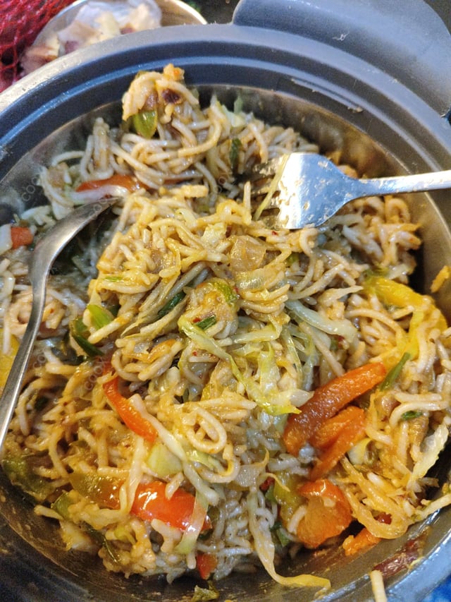 Delicious Veg Hakka Noodles prepared by COOX