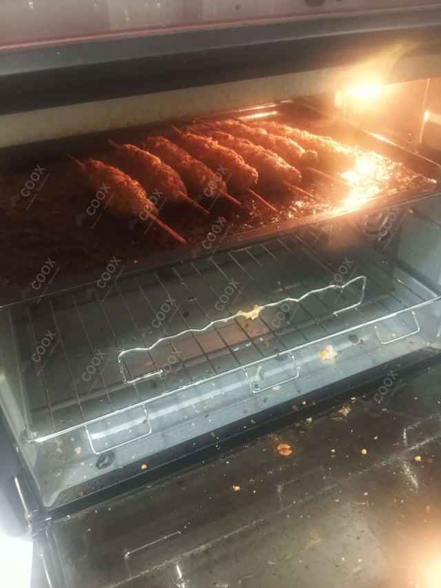 Delicious Mutton Seekh Kebab prepared by COOX