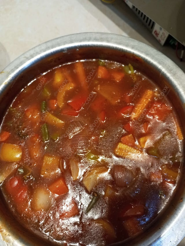 Delicious Mix Veg in Schezwan Sauce prepared by COOX