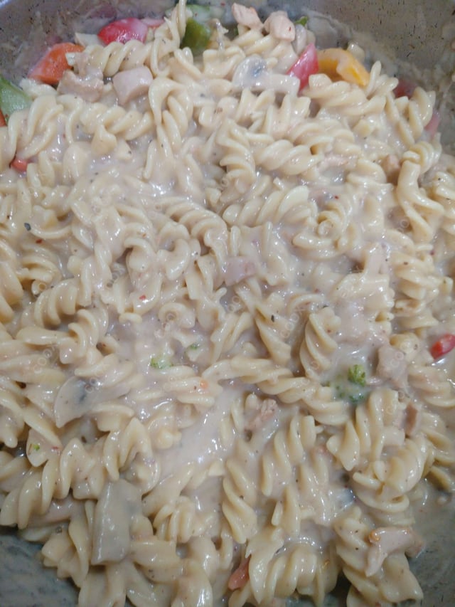 Tasty Chicken Pasta in White Sauce cooked by COOX chefs cooks during occasions parties events at home