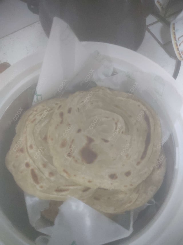 Delicious Lachha Paranthas prepared by COOX