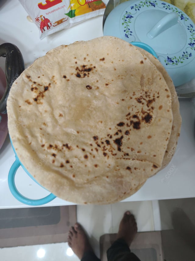 Delicious Tawa Rotis prepared by COOX