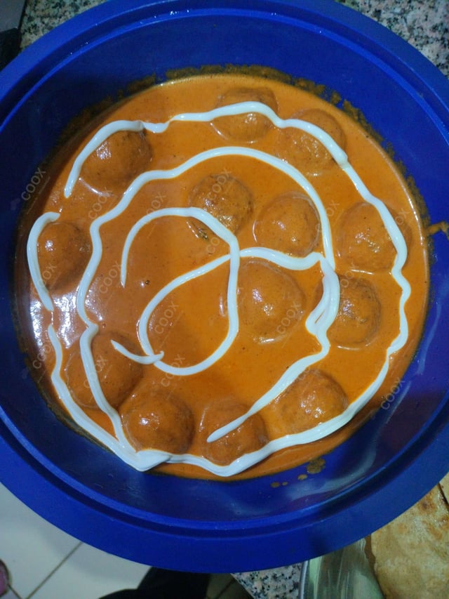 Delicious Malai Kofta (Orange Gravy) prepared by COOX