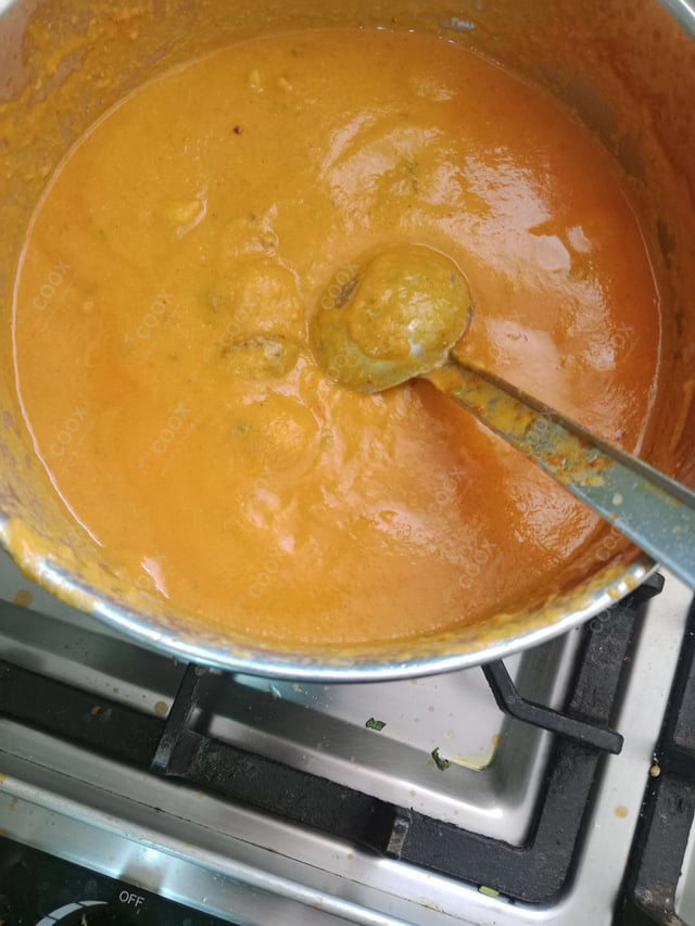 Delicious Dum Aloo prepared by COOX