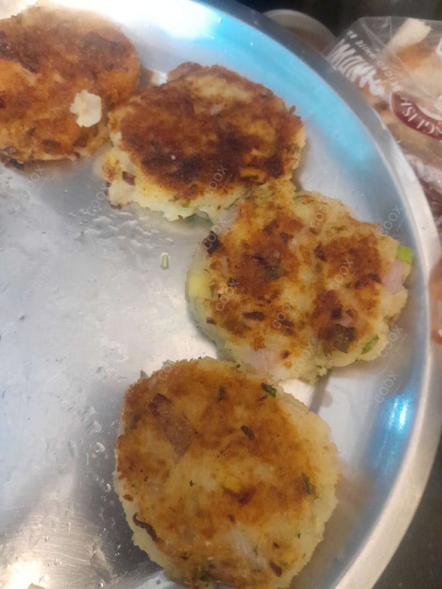 Delicious Aloo Tikki Chaat prepared by COOX