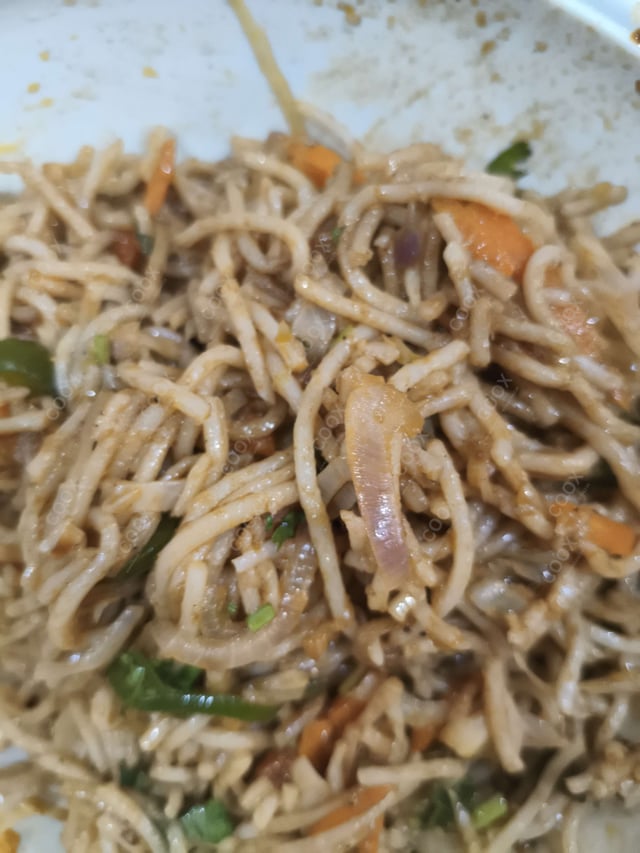 Delicious Veg Hakka Noodles prepared by COOX