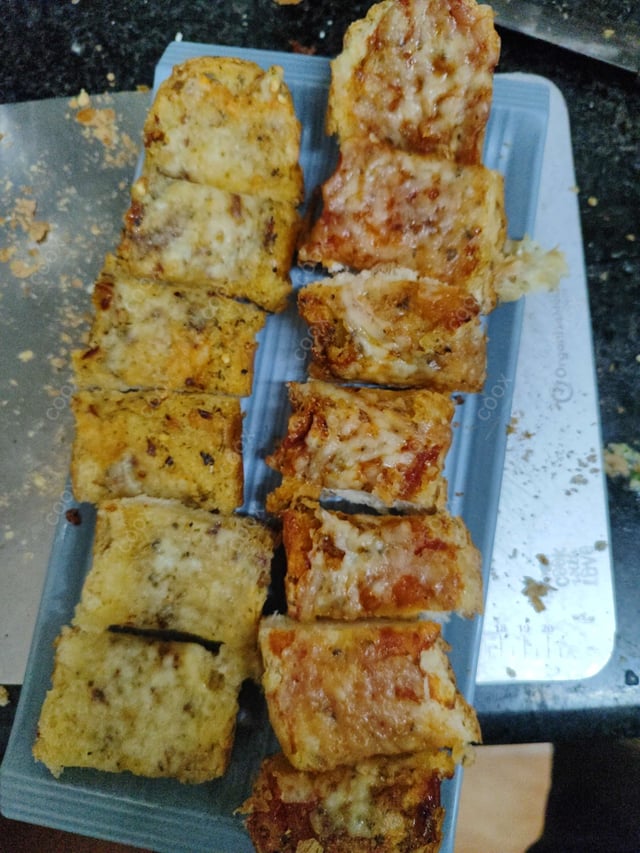 Delicious Garlic Bread with Cheese prepared by COOX