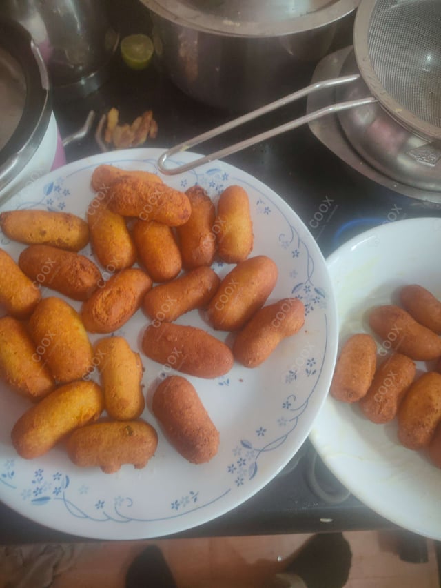 Delicious Malai Kofta (Orange Gravy) prepared by COOX