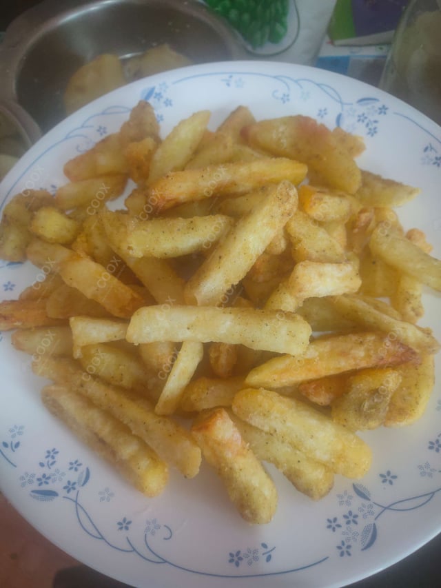 Delicious Honey Chilli Potato prepared by COOX