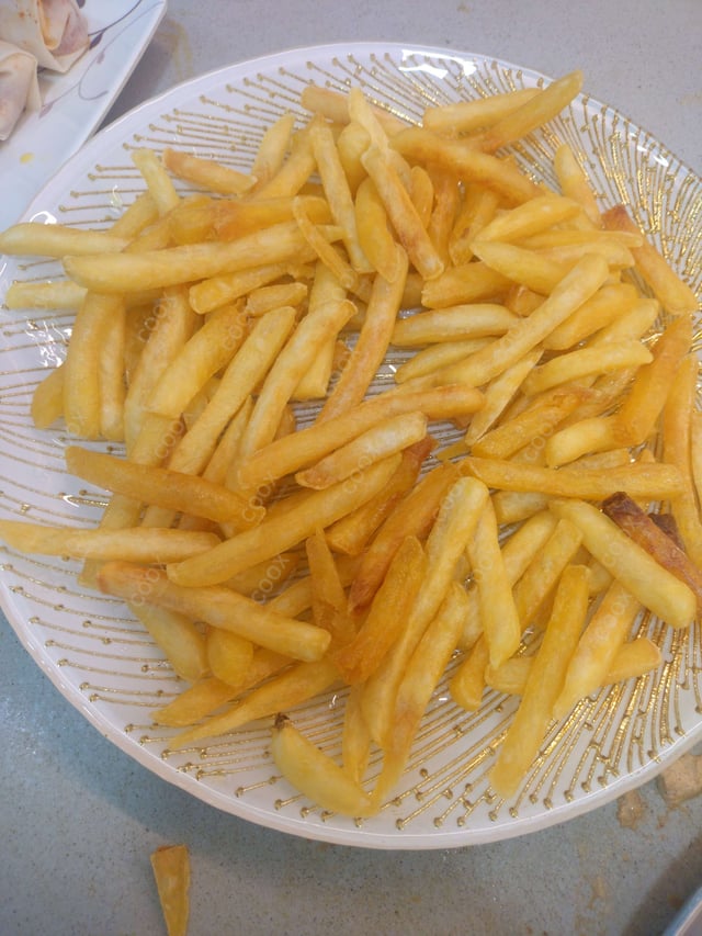 Delicious French Fries prepared by COOX