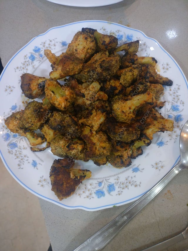 Tasty Tandoori Broccoli cooked by COOX chefs cooks during occasions parties events at home