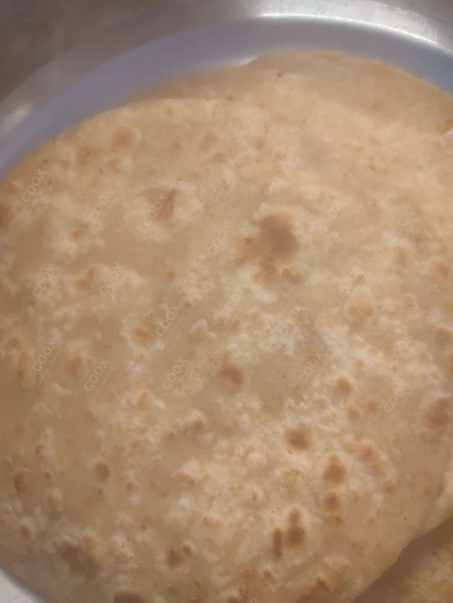 Delicious Makki ki Rotis prepared by COOX