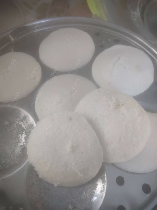 Tasty Plain Idli cooked by COOX chefs cooks during occasions parties events at home