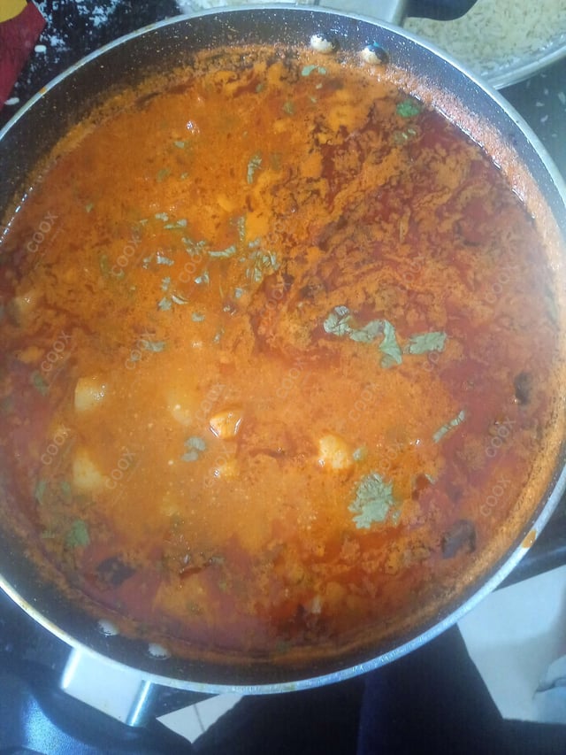 Delicious Aloo Rasedar prepared by COOX