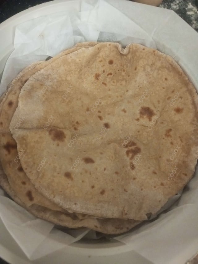 Delicious Tawa Rotis prepared by COOX