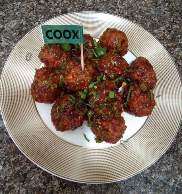 Tasty Veg Manchurian (Dry) cooked by COOX chefs cooks during occasions parties events at home