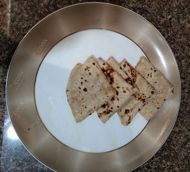 Tasty Lachha Paranthas cooked by COOX chefs cooks during occasions parties events at home