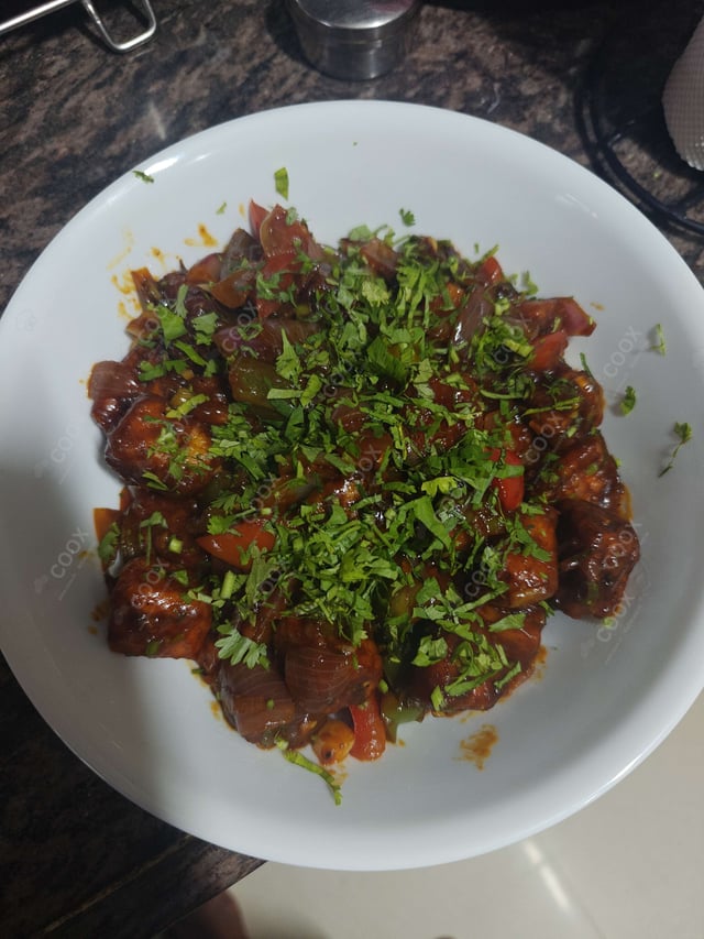 Delicious Chilli Paneer (Dry) prepared by COOX
