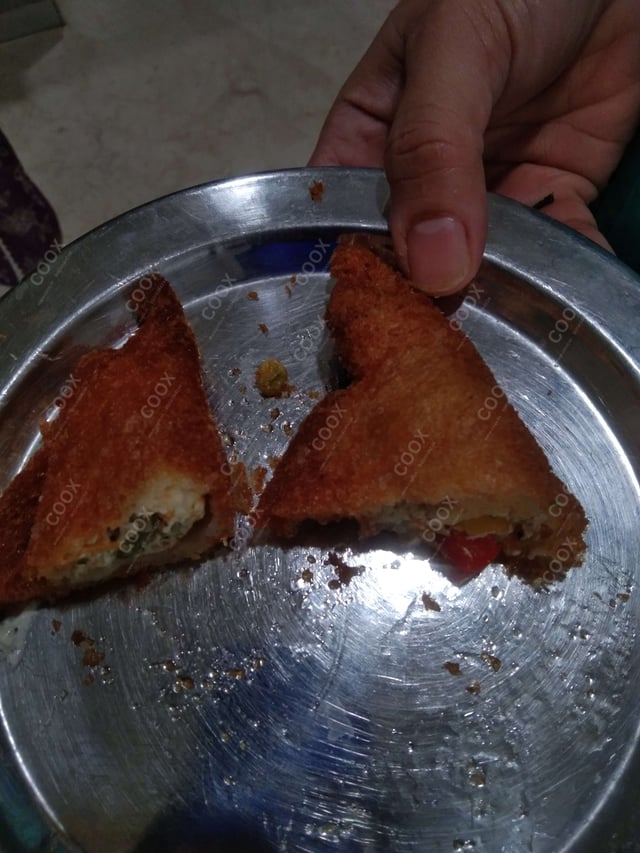 Delicious Dahi ke Sholey prepared by COOX