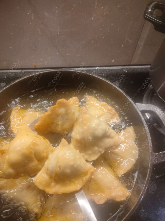 Delicious Mini Samosas prepared by COOX