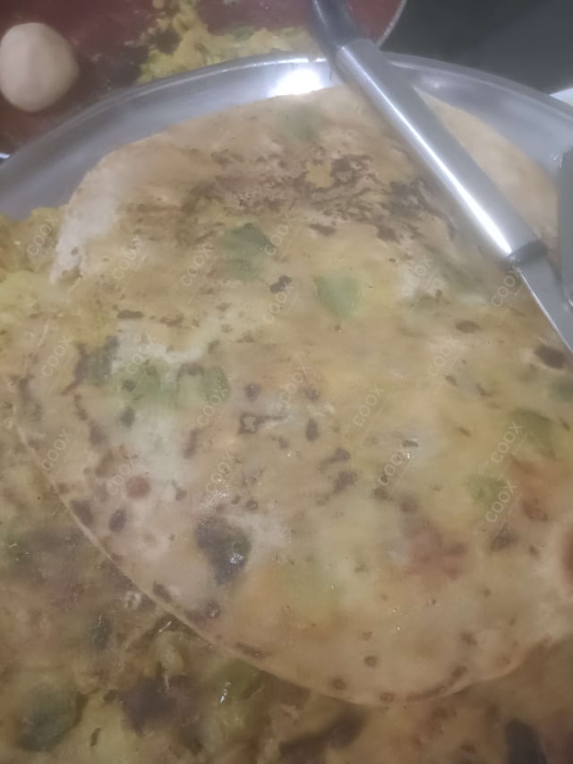 Delicious Stuffed Paranthas prepared by COOX