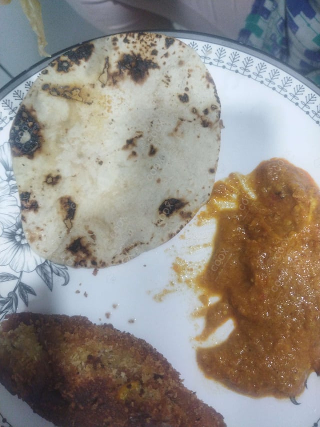 Delicious Naan (Butter / Garlic) prepared by COOX