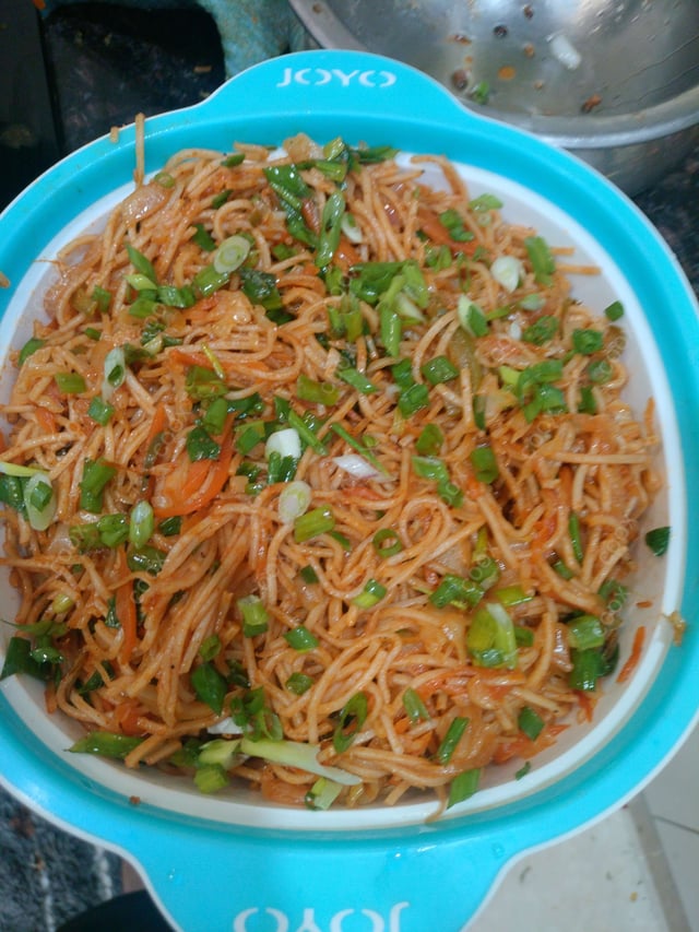 Delicious Veg Hakka Noodles prepared by COOX