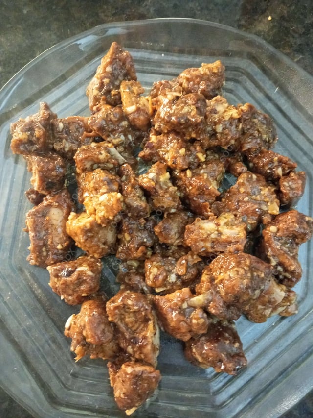 Delicious Chicken In Burnt Garlic Sauce prepared by COOX