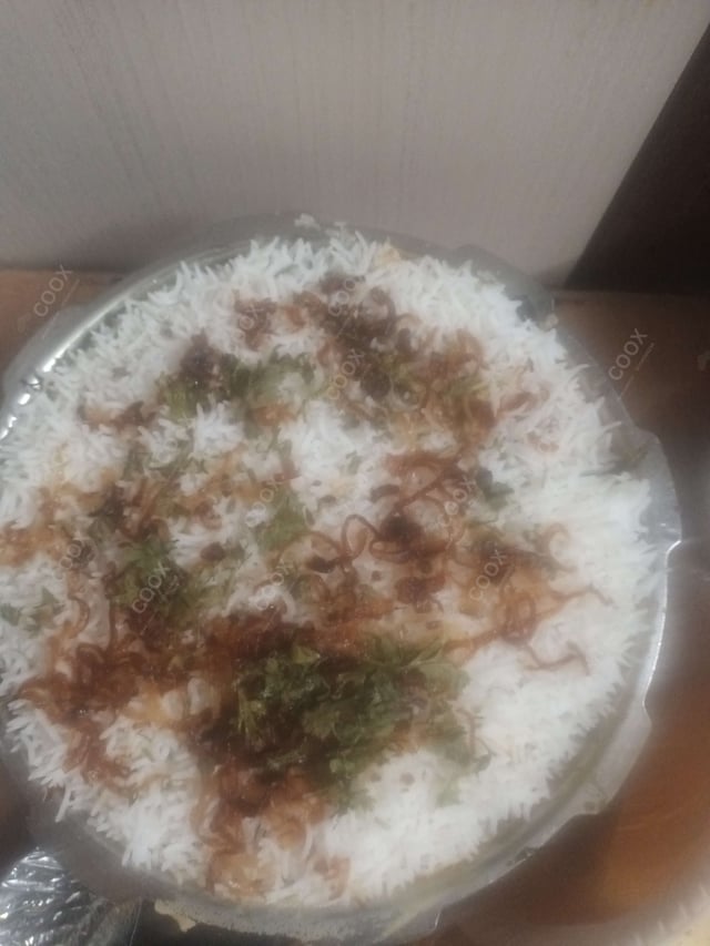 Tasty Egg Biryani cooked by COOX chefs cooks during occasions parties events at home