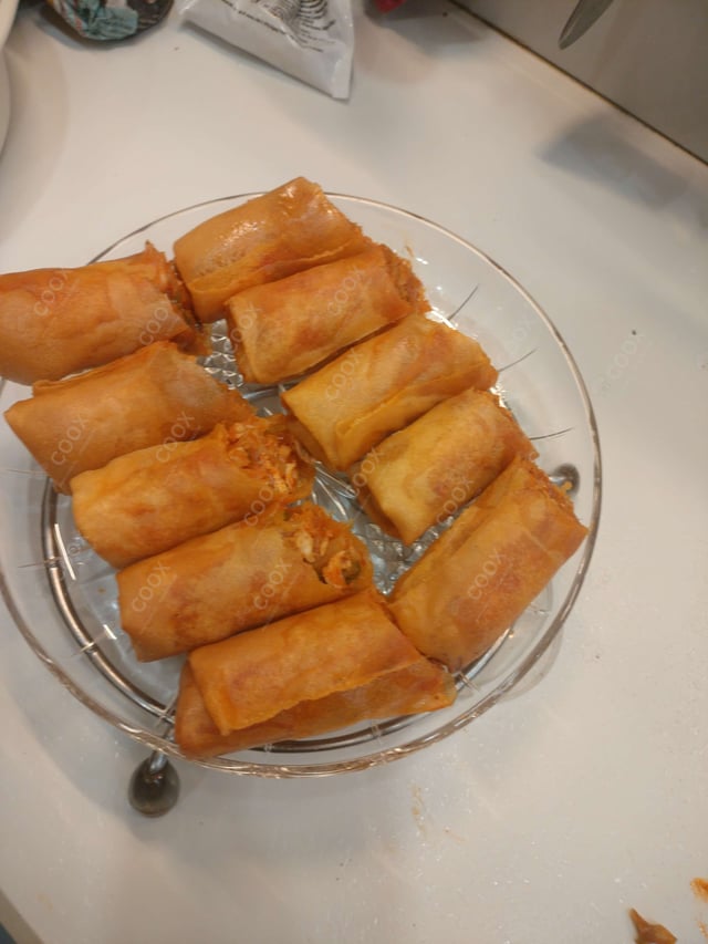 Delicious Chicken Spring Rolls prepared by COOX