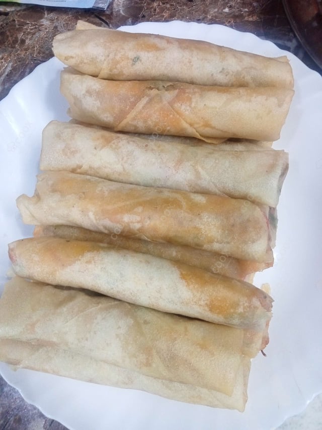 Delicious Veg Spring Rolls prepared by COOX