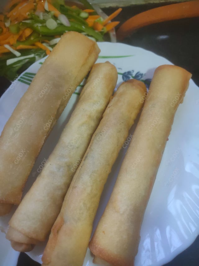 Delicious Veg Spring Rolls prepared by COOX