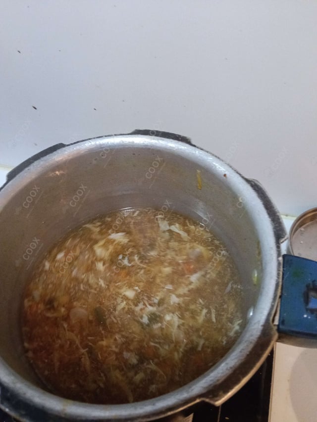 Tasty Chicken Manchow Soup cooked by COOX chefs cooks during occasions parties events at home