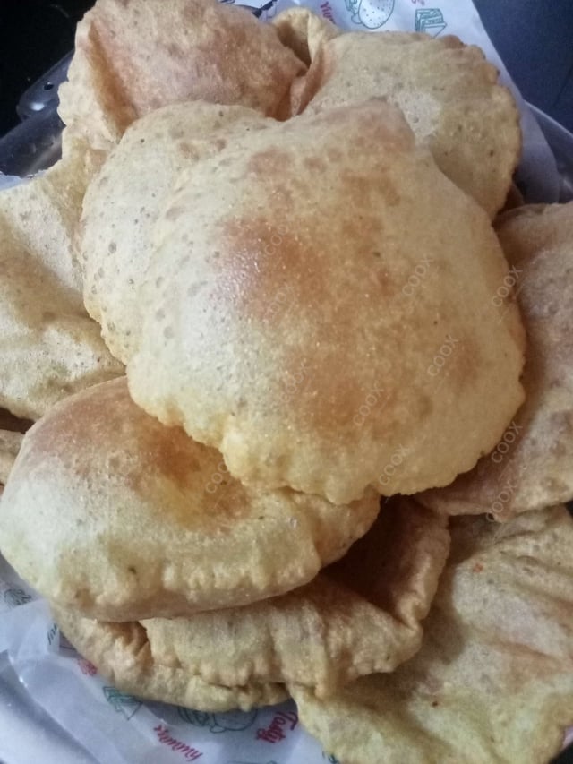 Delicious Pooris & Bedmis prepared by COOX