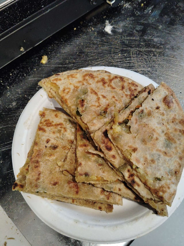 Delicious Stuffed Paranthas prepared by COOX