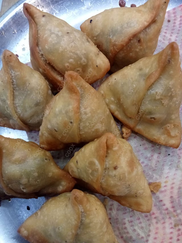 Delicious Mini Samosas prepared by COOX