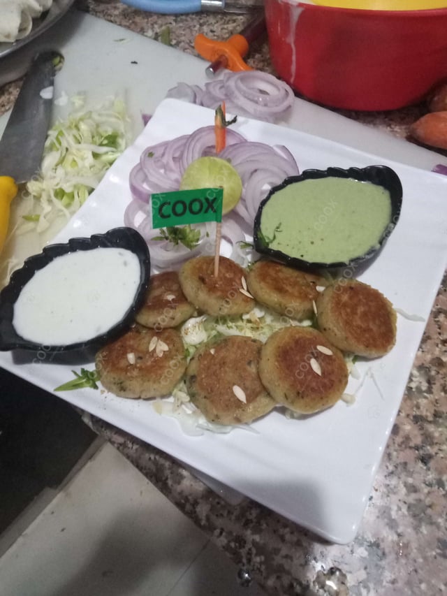 Tasty Aloo Tikki Chaat cooked by COOX chefs cooks during occasions parties events at home