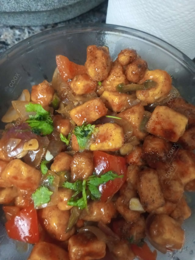Delicious Chilli Paneer (Dry) prepared by COOX
