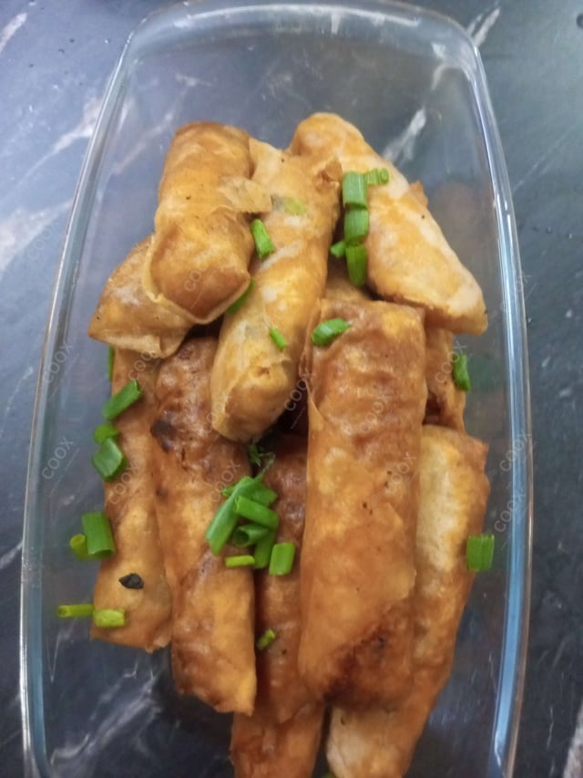 Delicious Veg Spring Rolls prepared by COOX