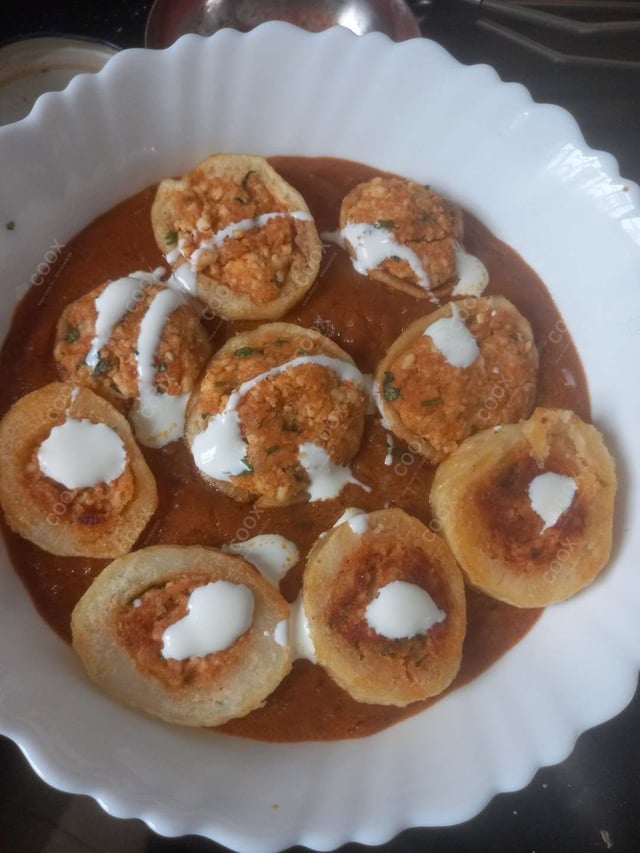 Delicious Stuffed Potatoes (Gravy) prepared by COOX