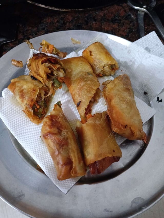 Delicious Veg Spring Rolls prepared by COOX