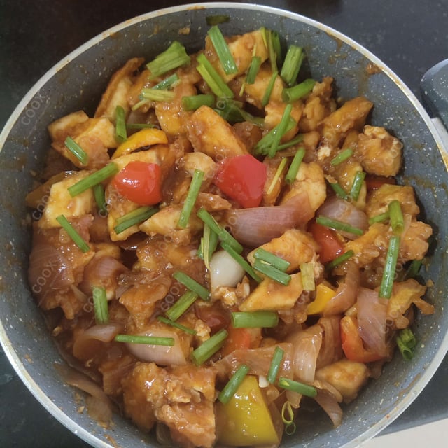 Tasty Chilli Paneer (Gravy) cooked by COOX chefs cooks during occasions parties events at home